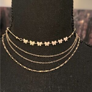 🦋🤍Golden Flutter: 4-Piece Necklace Set with Charming Butterfly Accents